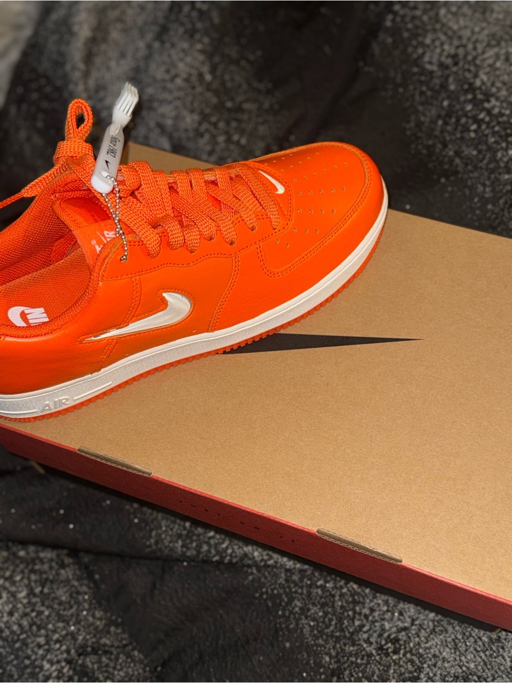 Nike Orange Low-Top Sneakers with White Swoosh